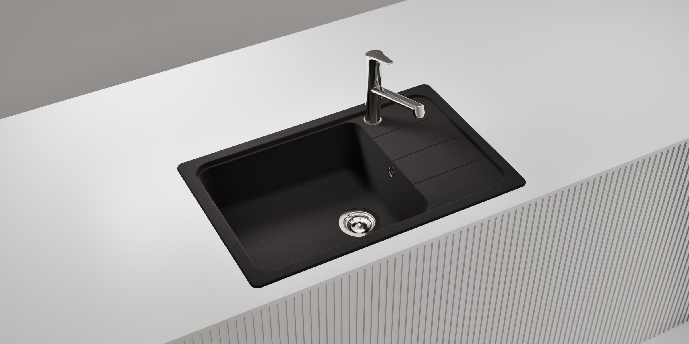 Évier granit noir Schock FORMHAUS 1 grand bac 1 petit égouttoir, solution idéale pour cuisine contemporaine.