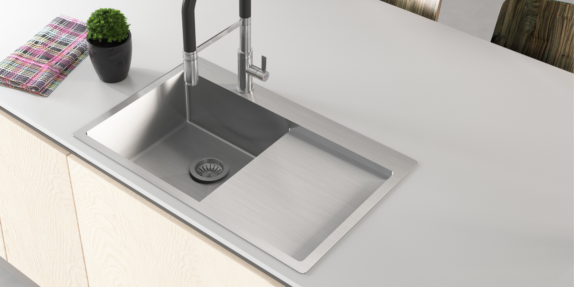 Moderne et fonctionnel, l’évier LUNY en inox avec bac et égouttoir à droite optimise votre espace cuisine.