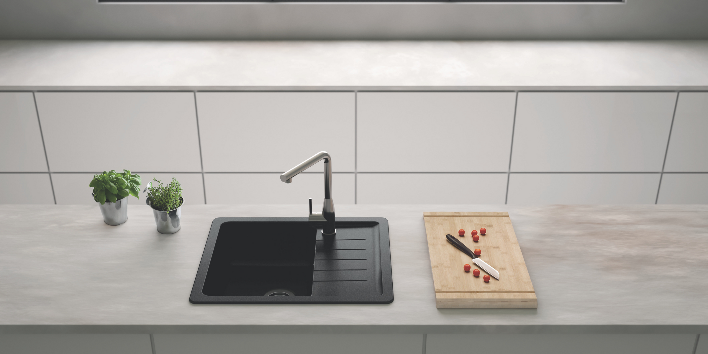 Compact et raffiné, l’évier NOUBA noir en granit avec bac et égouttoir s’intègre facilement dans toutes les cuisines.