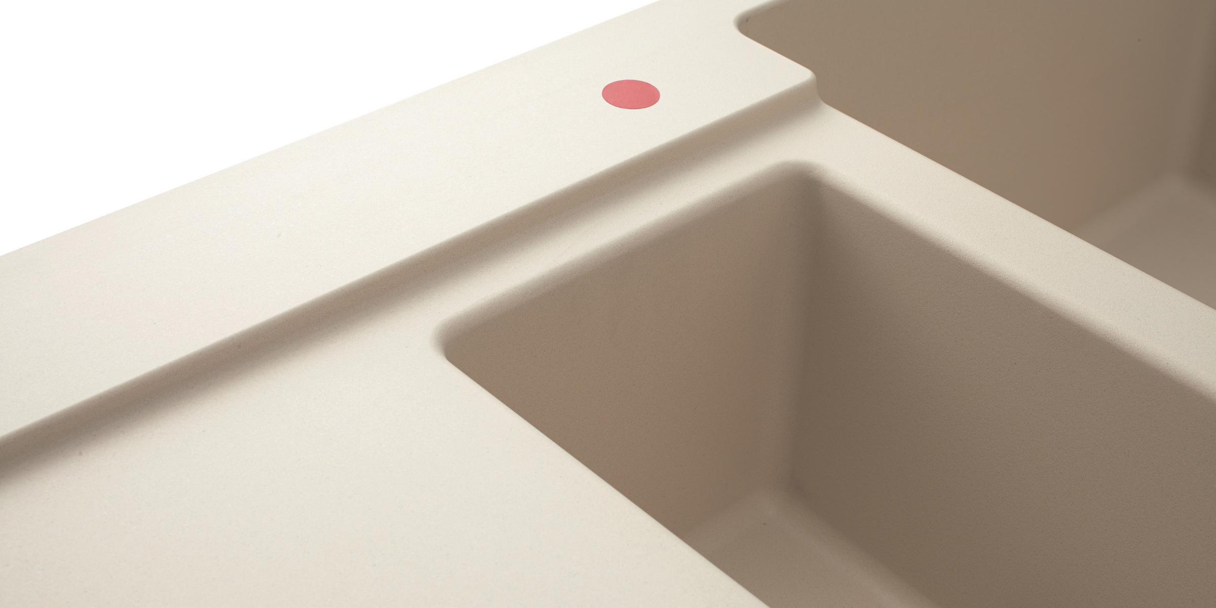 Praticité et design pour l’évier TAM TAM champagne en granit, avec 1 bac 1/2 et égouttoir.