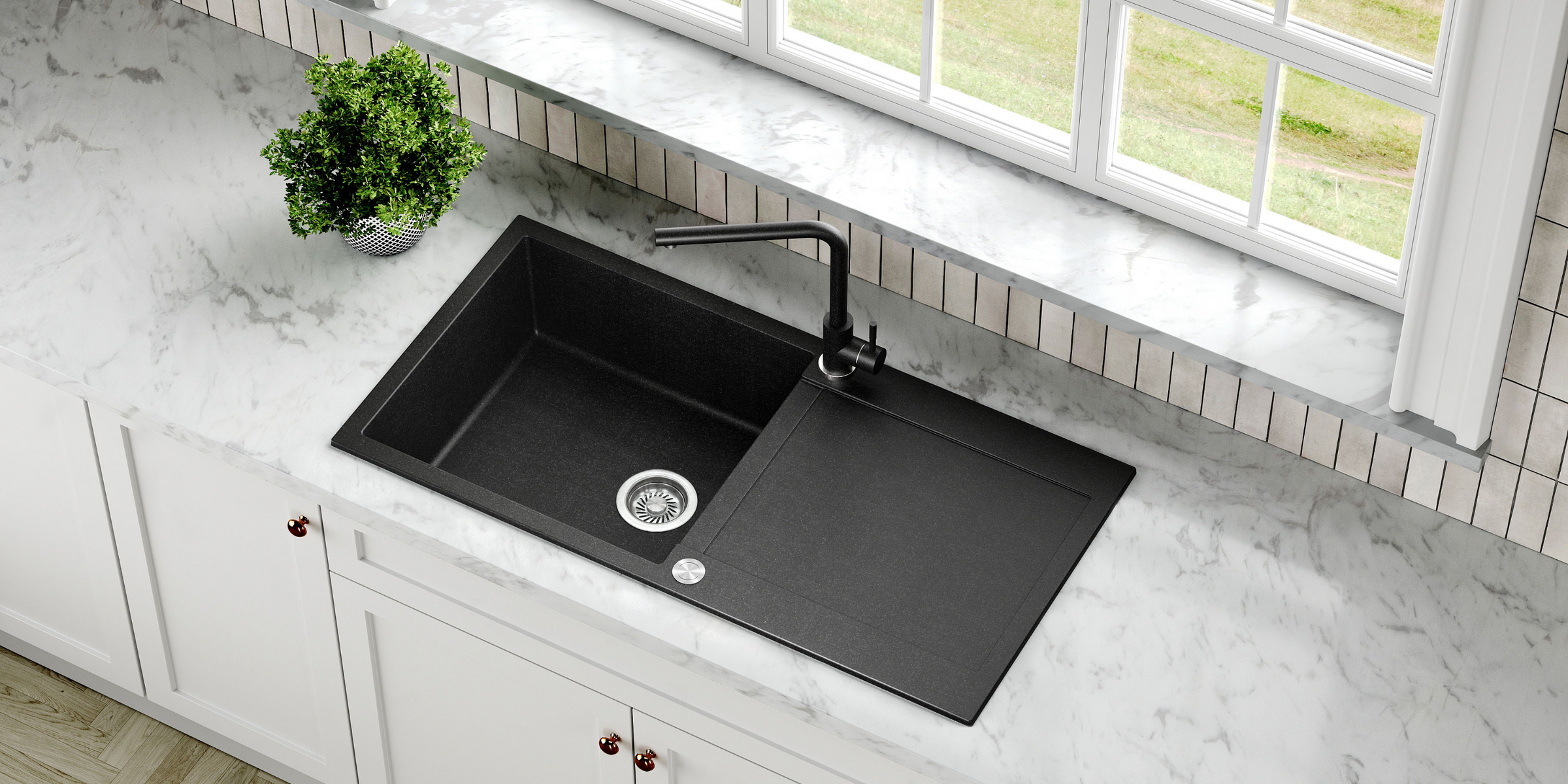 L’évier TESIS noir en granit, avec son grand bac et égouttoir, est un choix pratique et résistant pour votre cuisine.