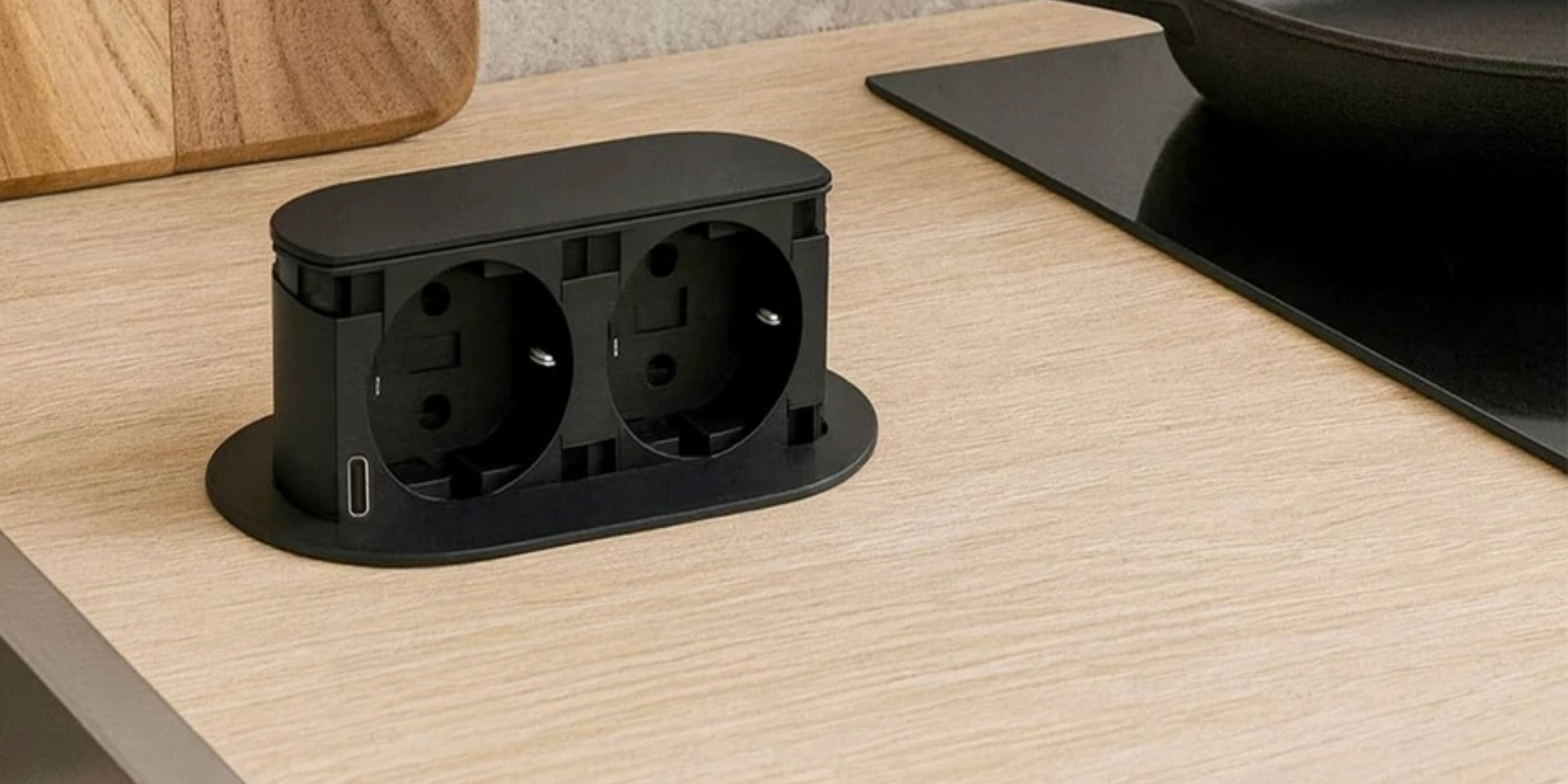 Prise plan de travail PIXEL rétractable noir- Double prise + 1 USB-C, technologie de charge rapide et design épuré.